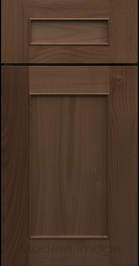 Detail view of a Chandler Shaker cabinet door in Driftwood stain with raised molding along the inner panel.